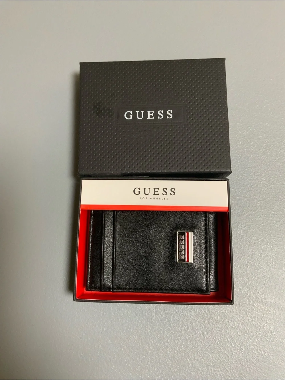 GUESS Black Leather Men's Wallet with Metal Logo Plaque